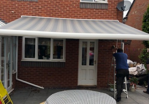 Grey Striped Awning over Kitchen window